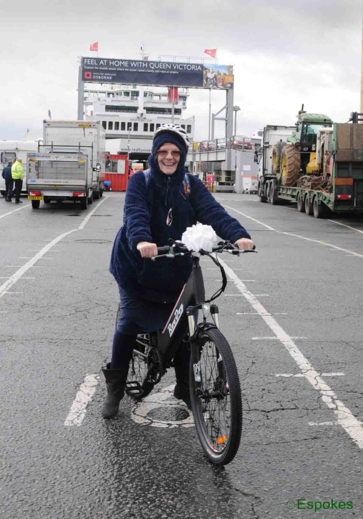 Claire Franklin of The Isle of Wight pictured collecting her RooDog Avatar step-through from the Red Funnel ferries terminal at Southampton Docks, Hampshire
